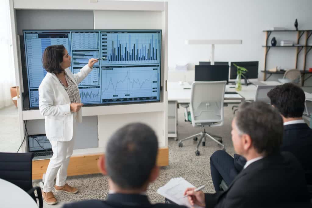 A person presenting an engaging presentation to a group of people